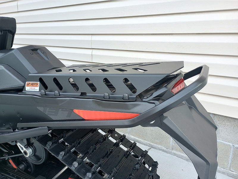 The top surface of the Pro Series 137x Cargo Rack extends above the taillight housing and rear bumper to accommodate longer cargo items that may extend beyond the tunnel.